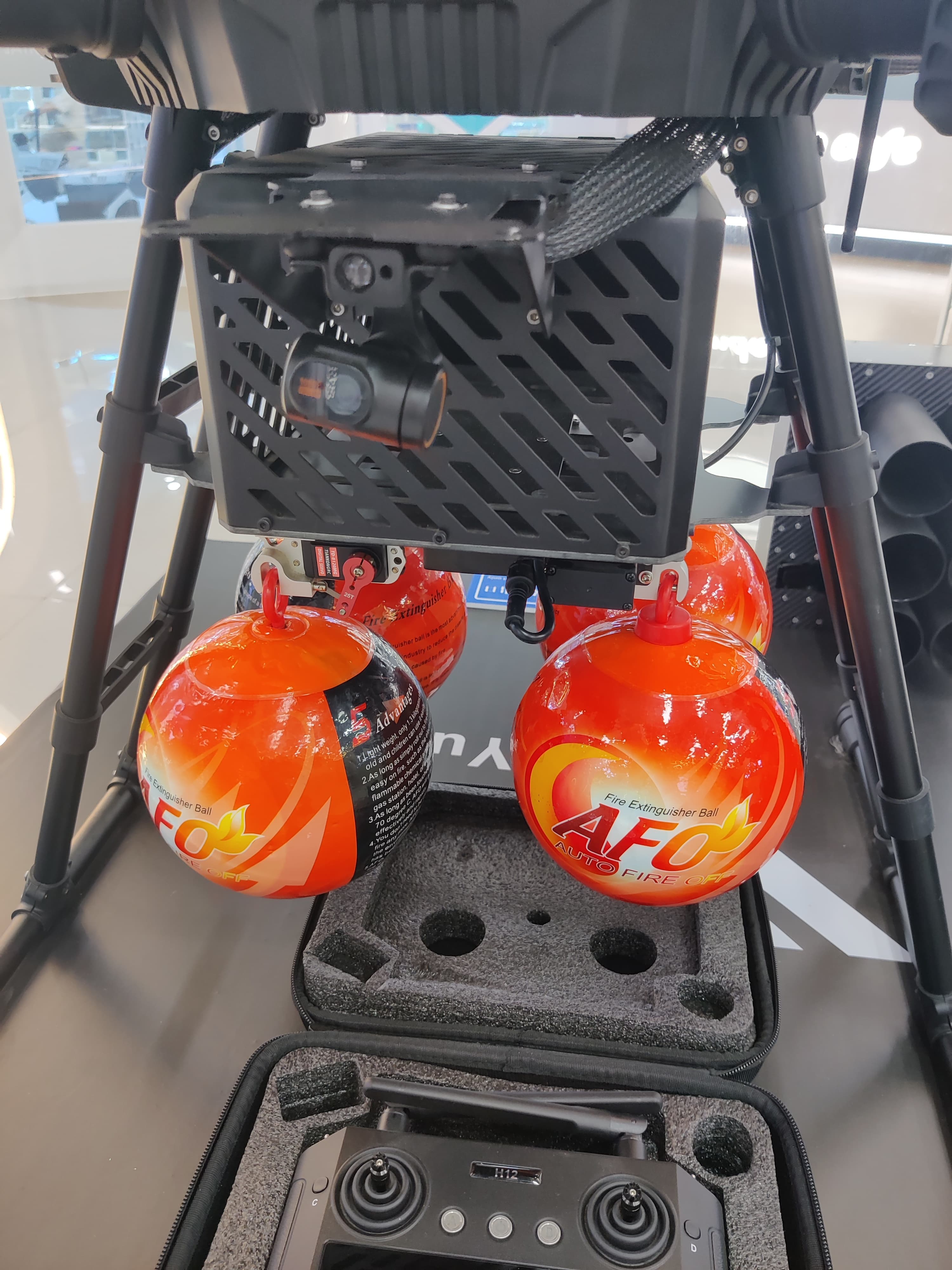 An industrial drone fitted with fire-suppression payloads