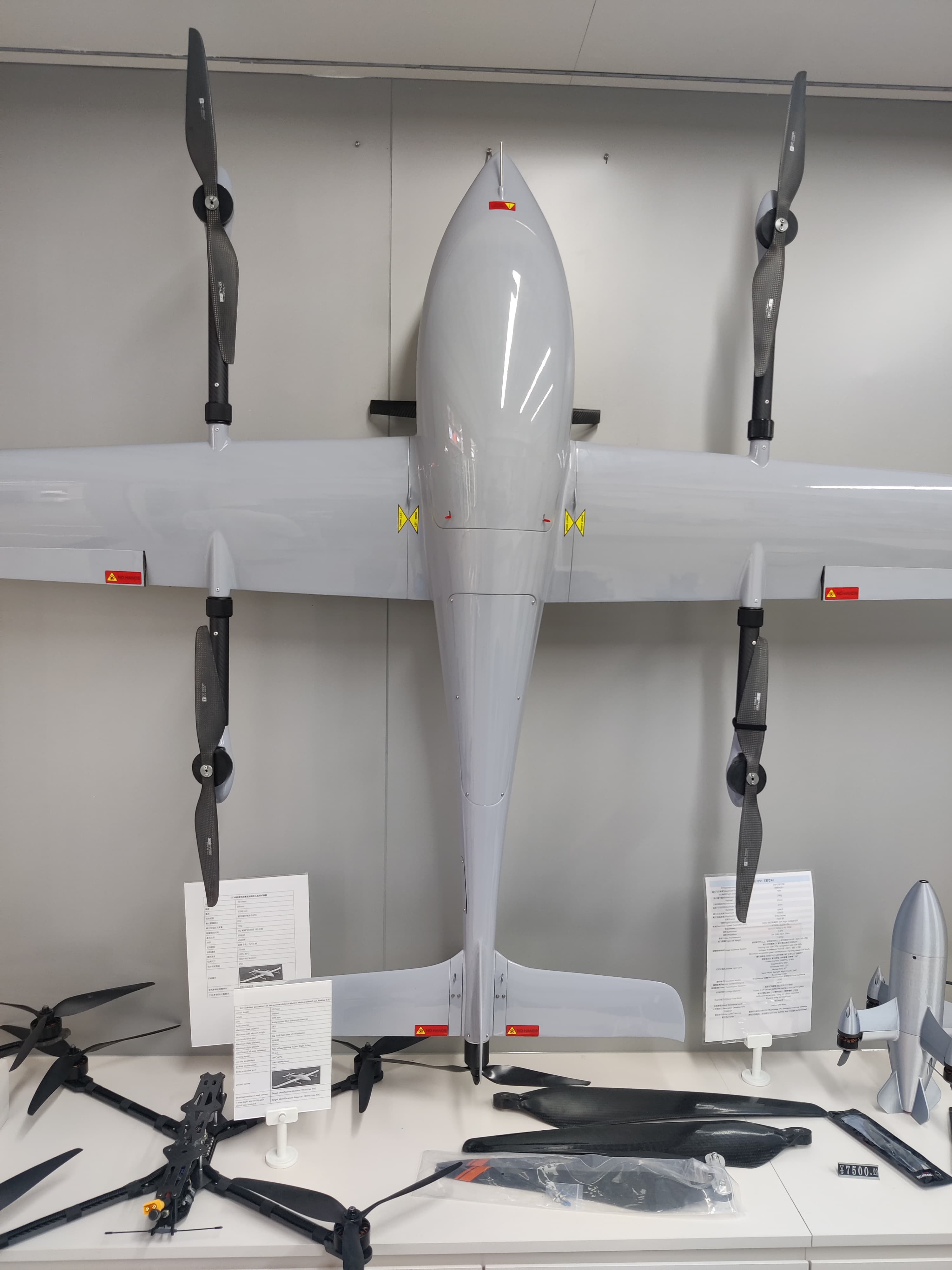 A fixed-wing survey drone on display